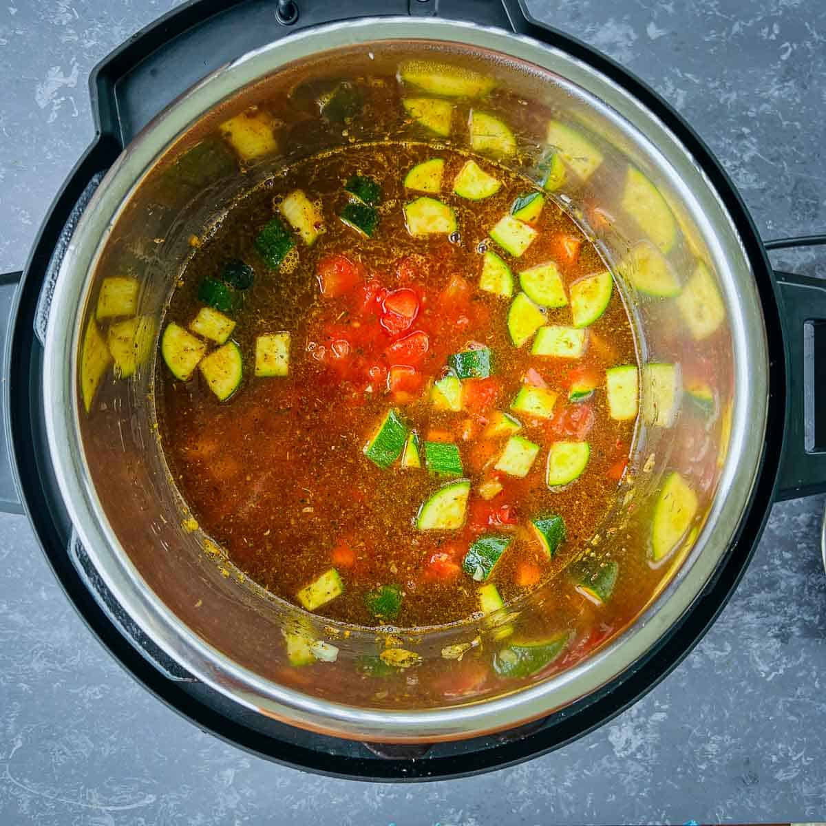 Stock added in Instant Pot.