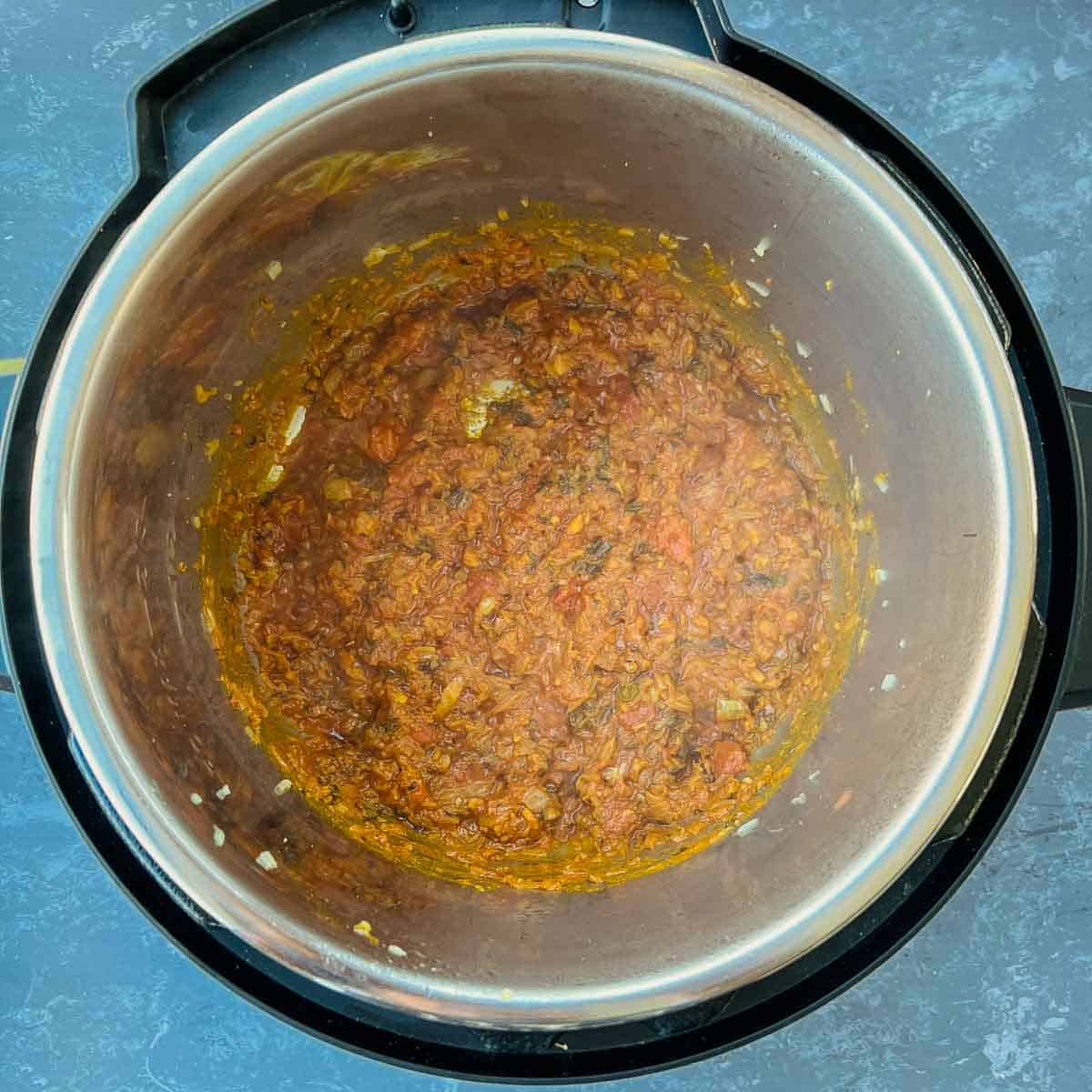 Cooked tomato and spices in Instant Pot.