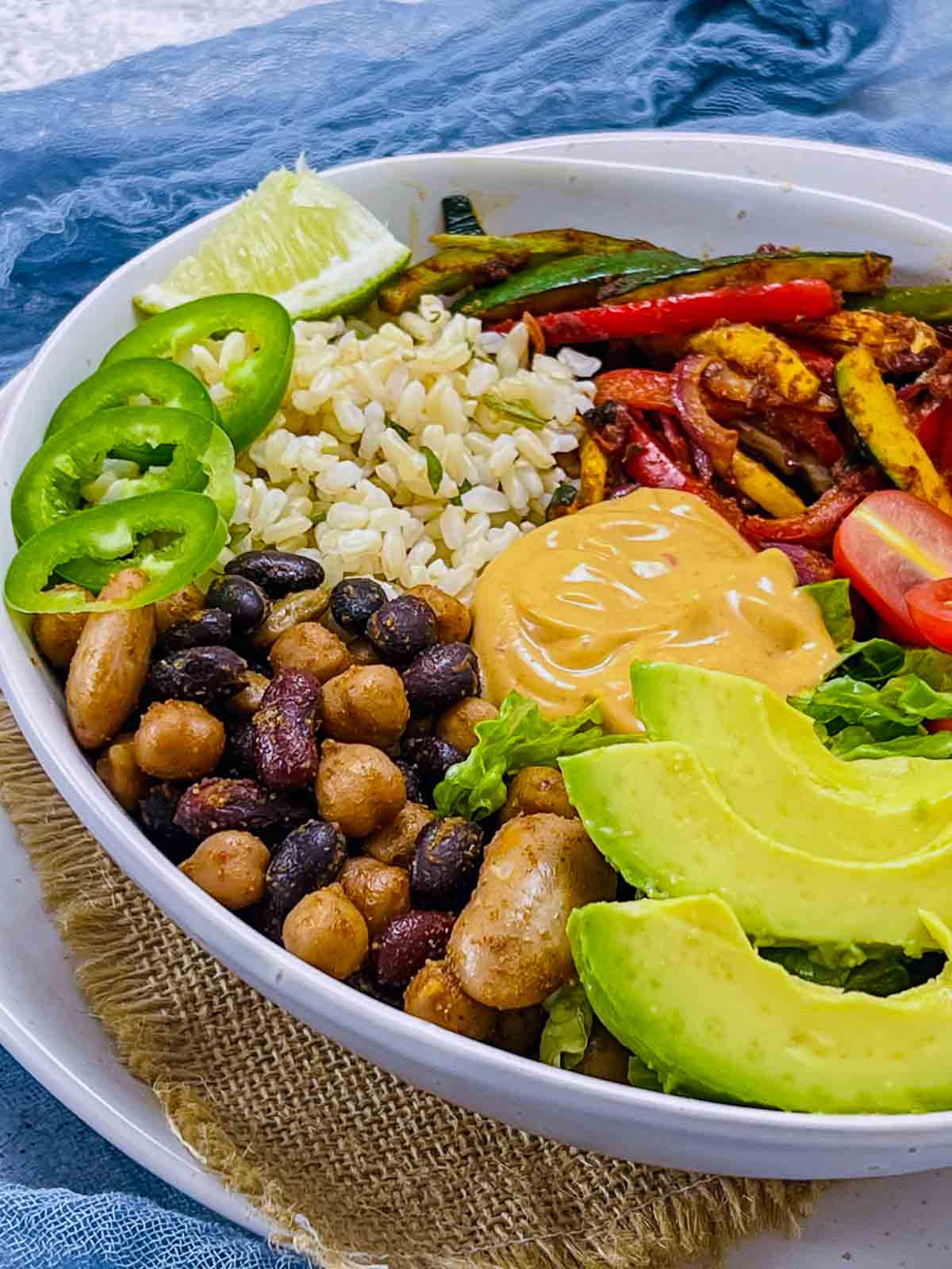 Mixed beans and avocado in taco Buddha bowl.