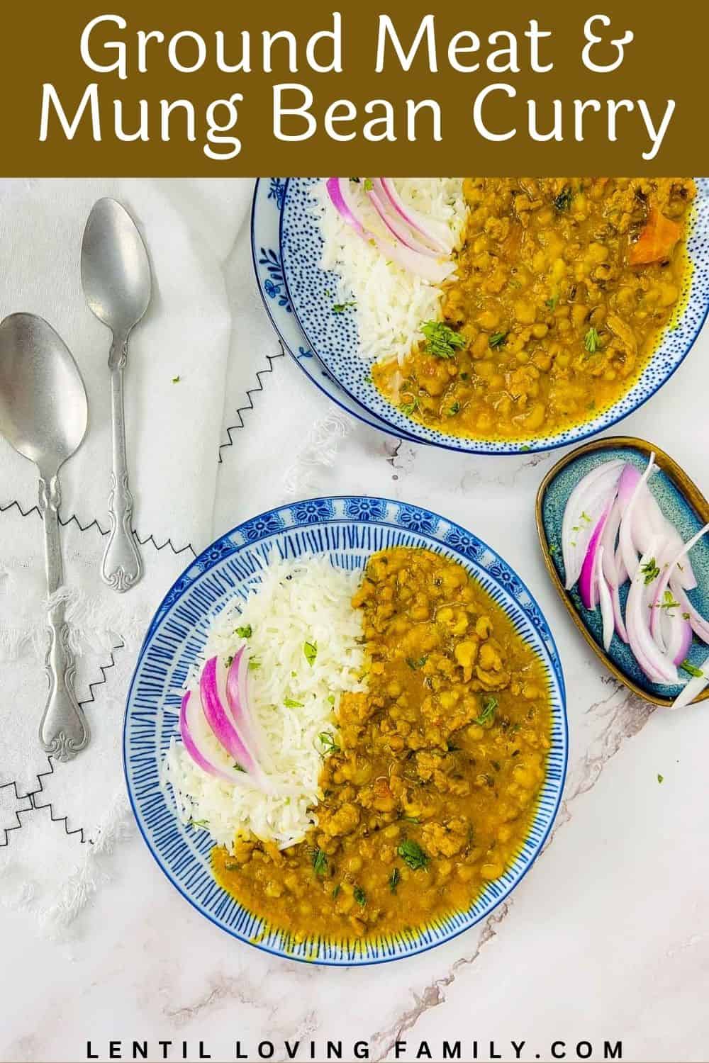 Keema green moong dal served with steamed rice and onion slices on two plates.