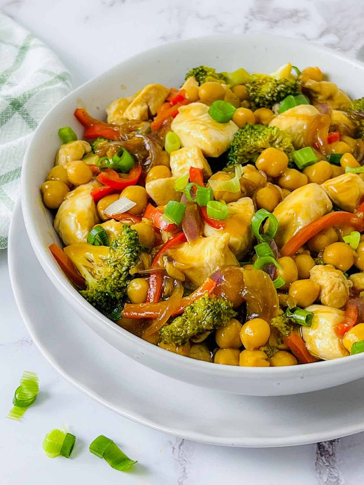 A bowl of chicken chickpea stir fry.