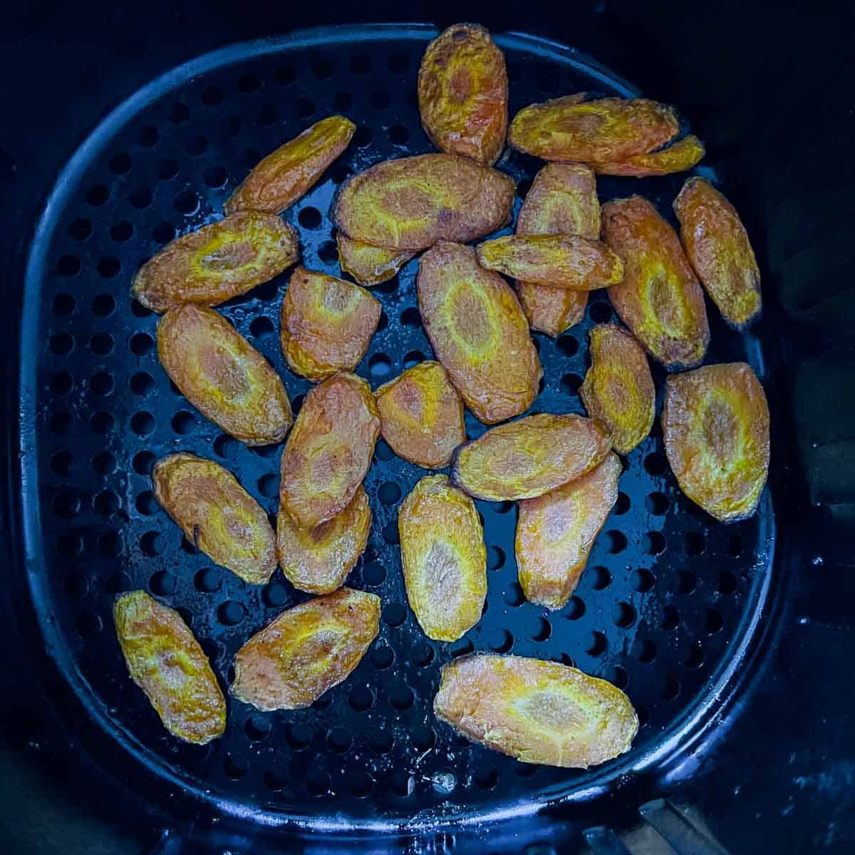 Roasted carrot slices in the air fryer.