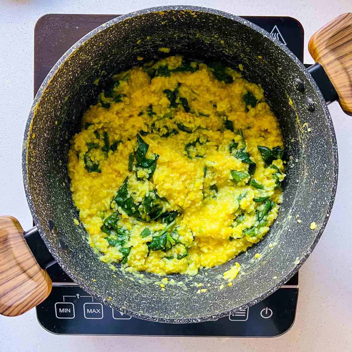 Spinach cooked in the khichdi.