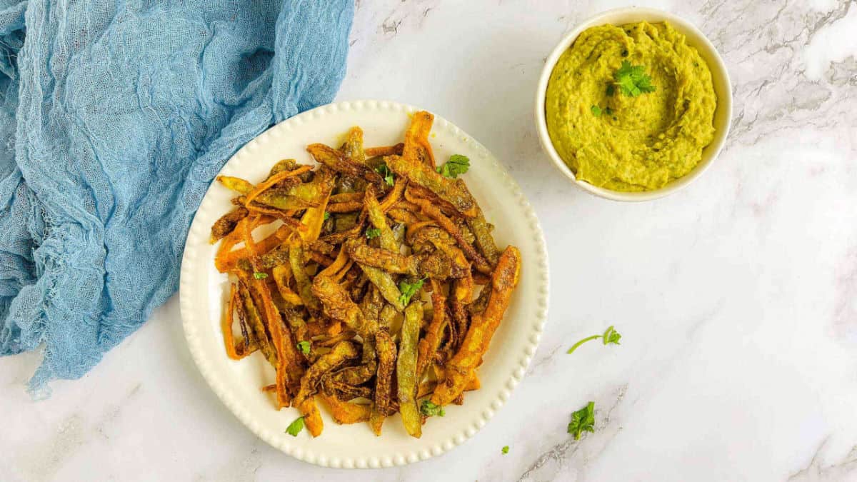 Vegetable peel chips served with curried bean dip.