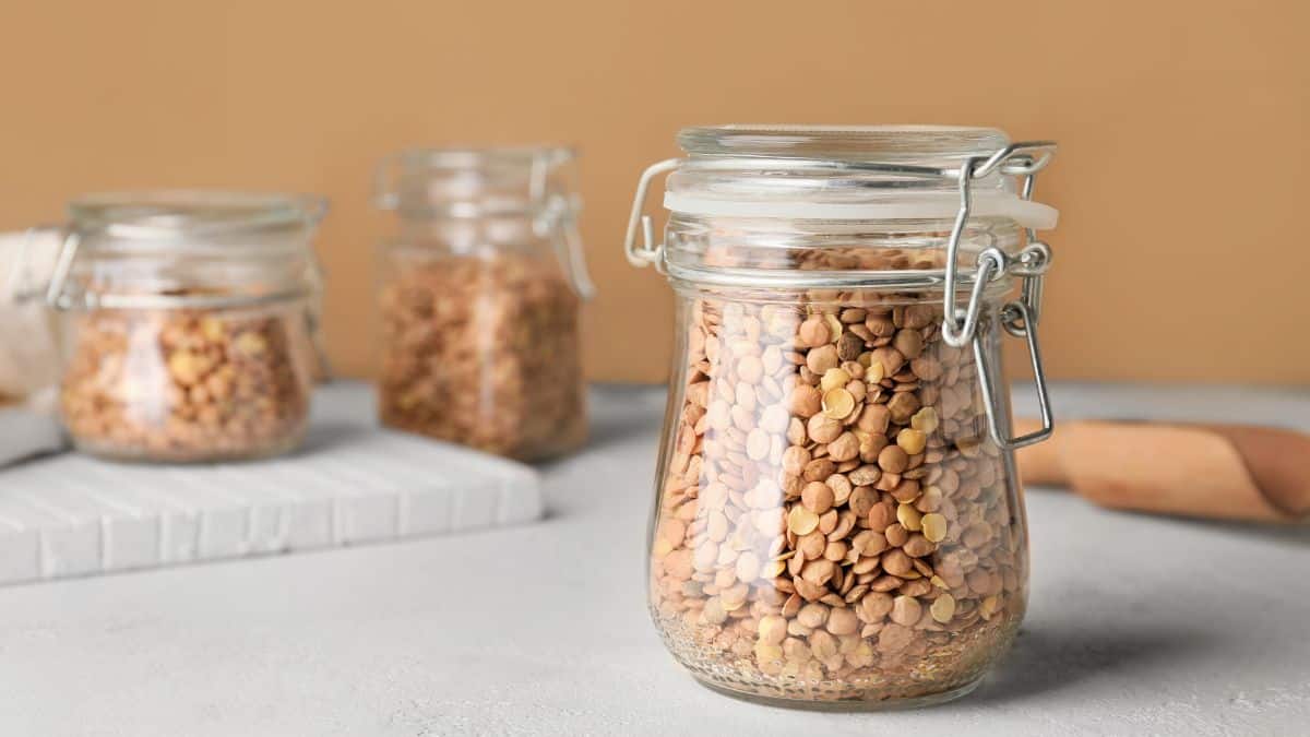 Lentils stored in glass jars.