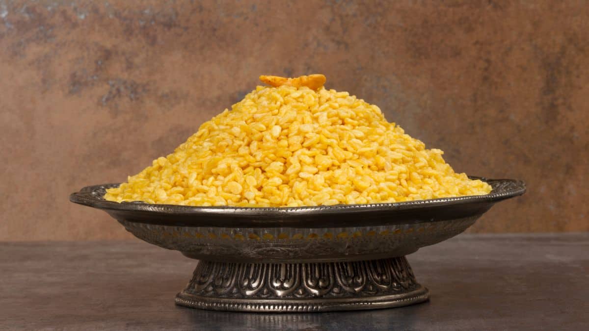 Yellow lentils in a traditional bowl.