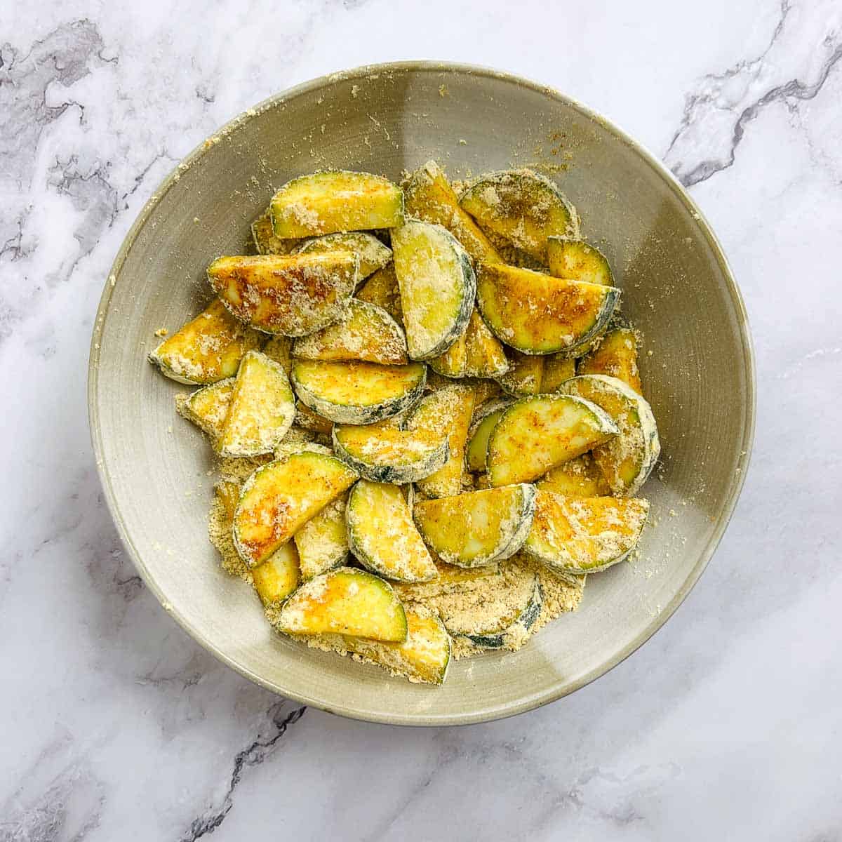 Zucchini slices coated with chickpea flour and spices.