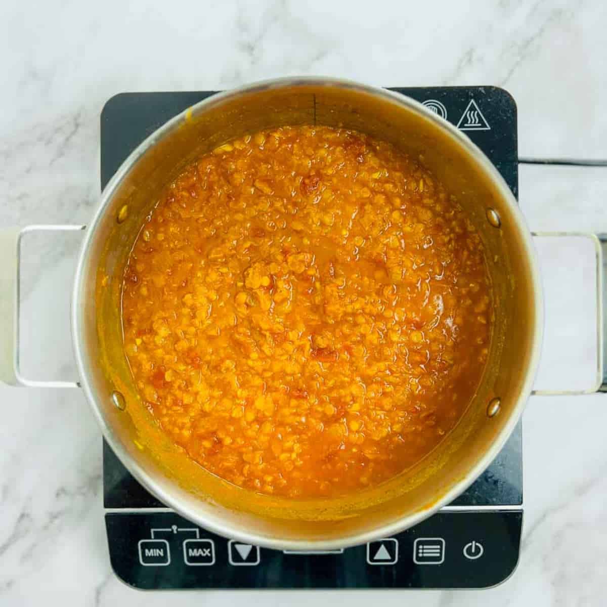 Red lentils cooked in the onion-tomato masala base.