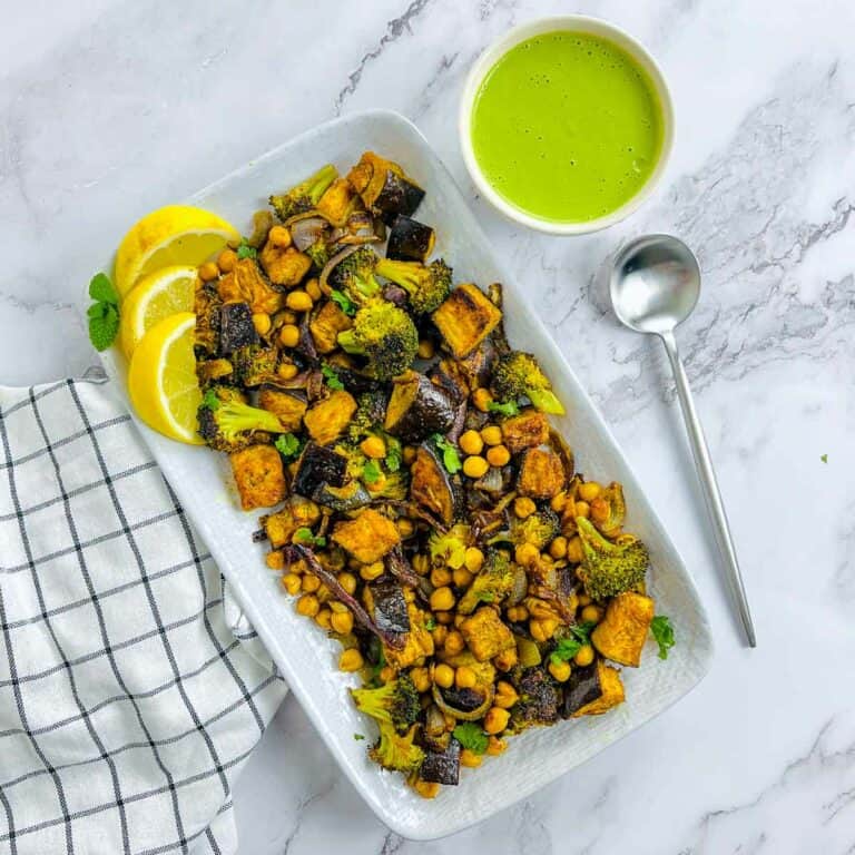 Roasted veggies and chickpeas served with mint yogurt sauce.