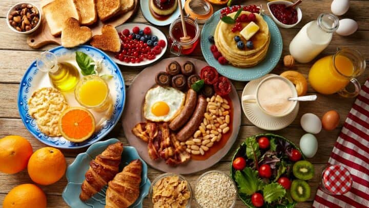 Breakfast spread on a wooden table.