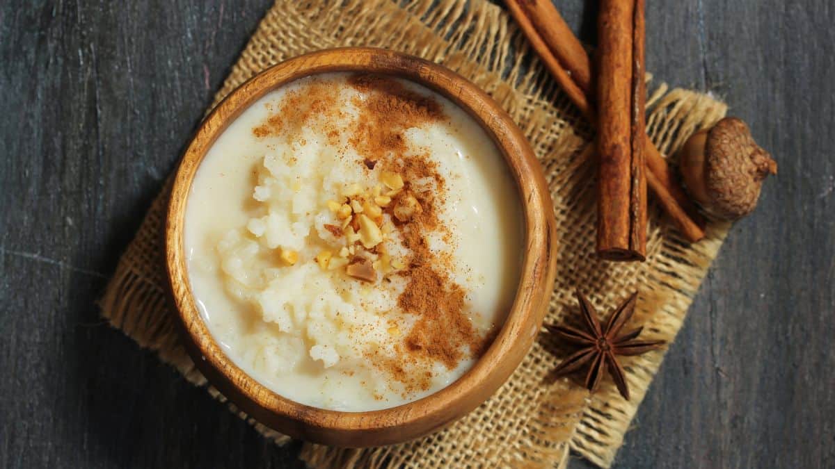 Rice pudding in a brown bowl.