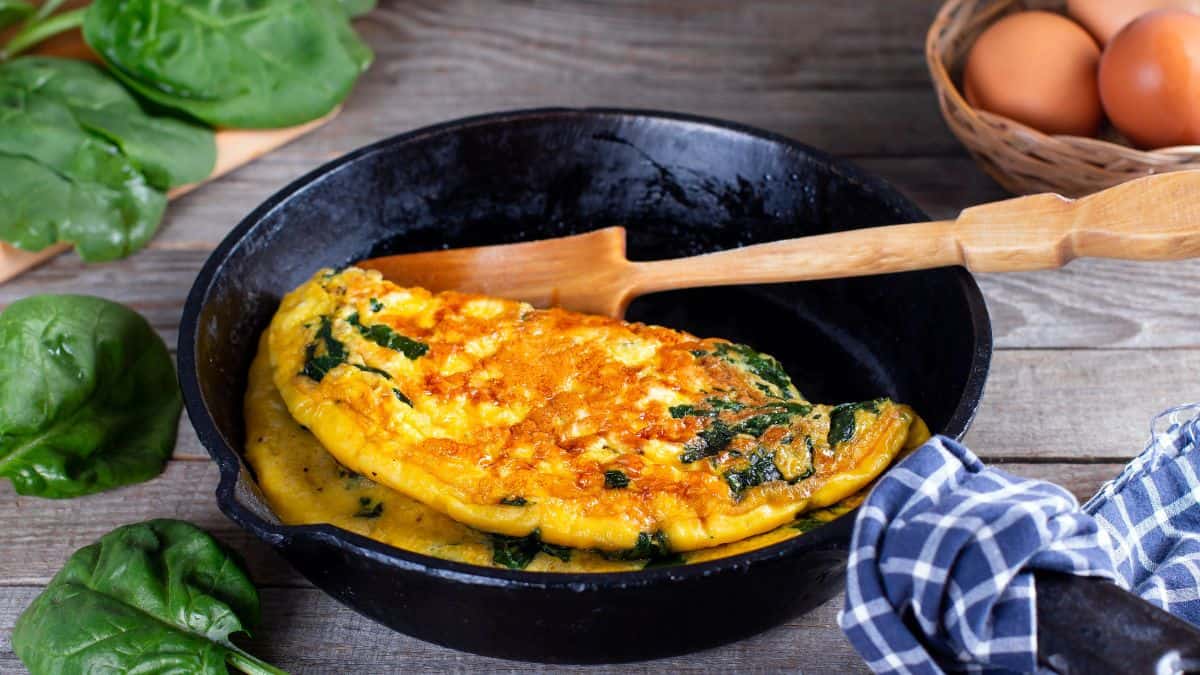 Making omelet in a frying pan.