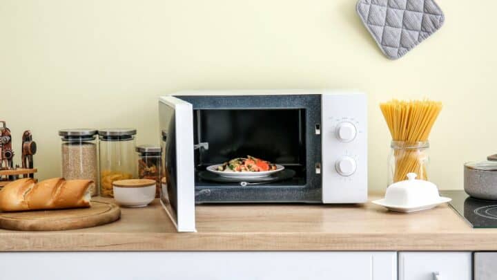 Microwave on a kitchen counter.