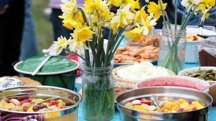 A potluck table with food.