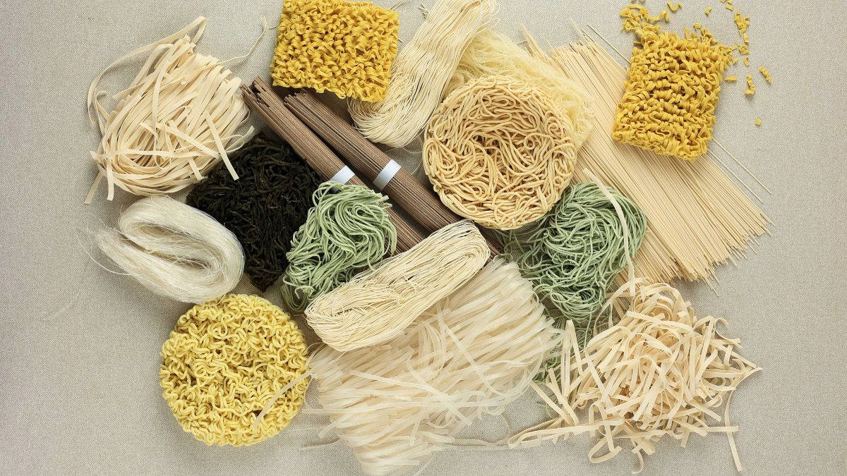 Different types of noodles on a table.