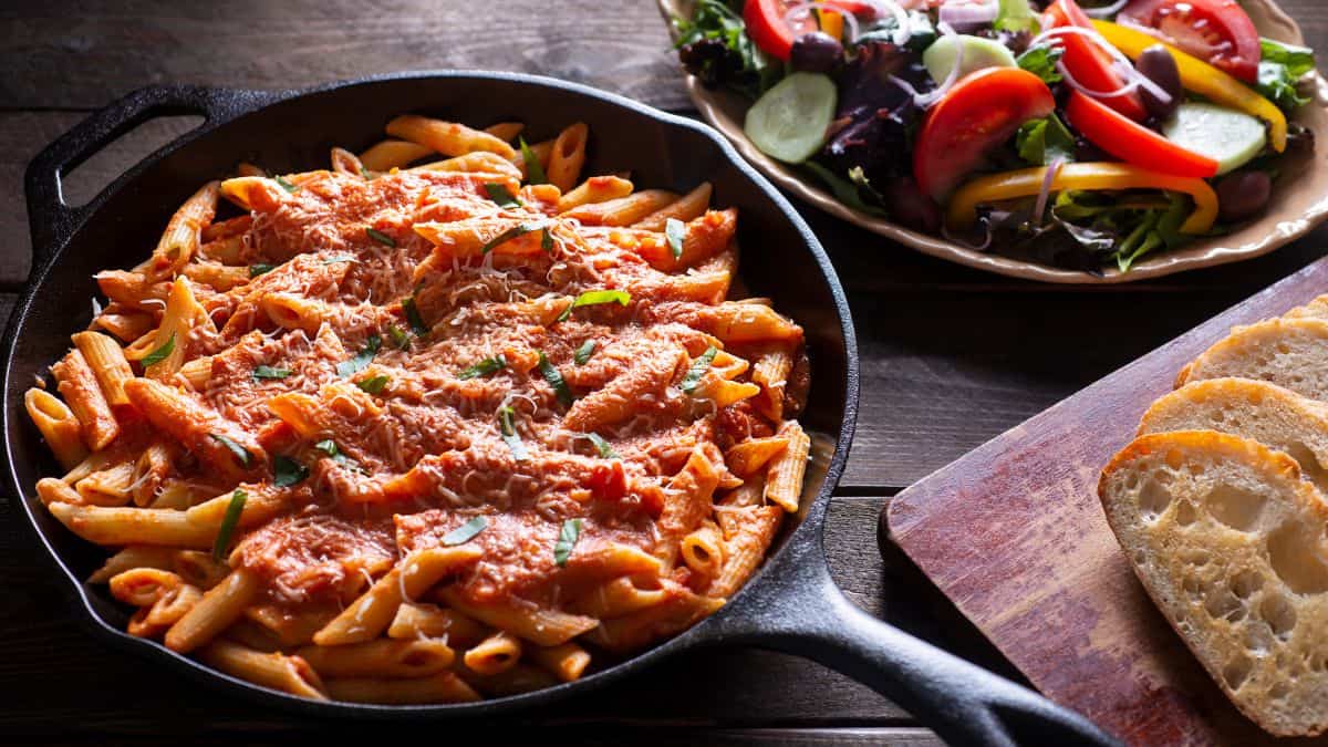 Vodka sauce penne pasta in a skillet.