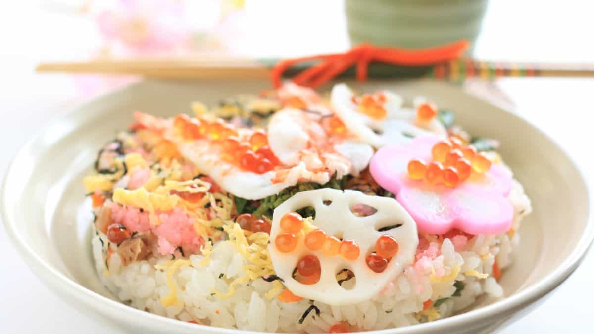 Chirashizushi bowl with chopsticks.