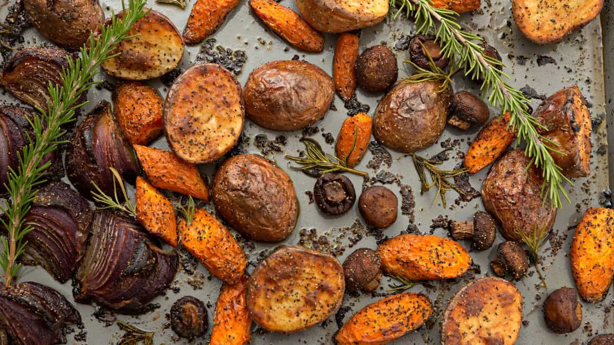 Roasted vegetables on a baking sheet.