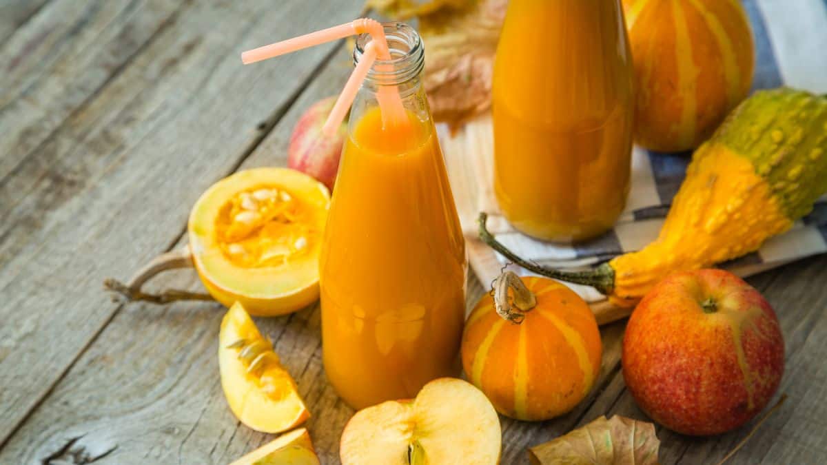 Glasses of pumpkin and apple smoothie.