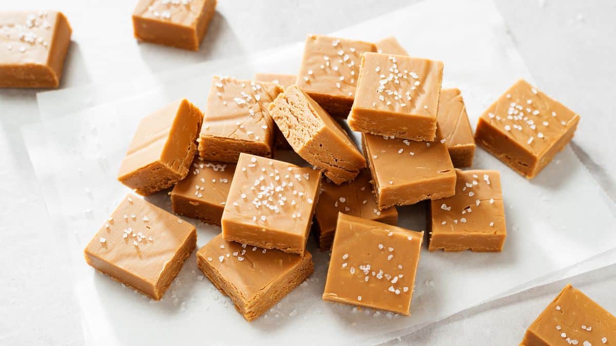 Pieces of fudge on a parchment paper.