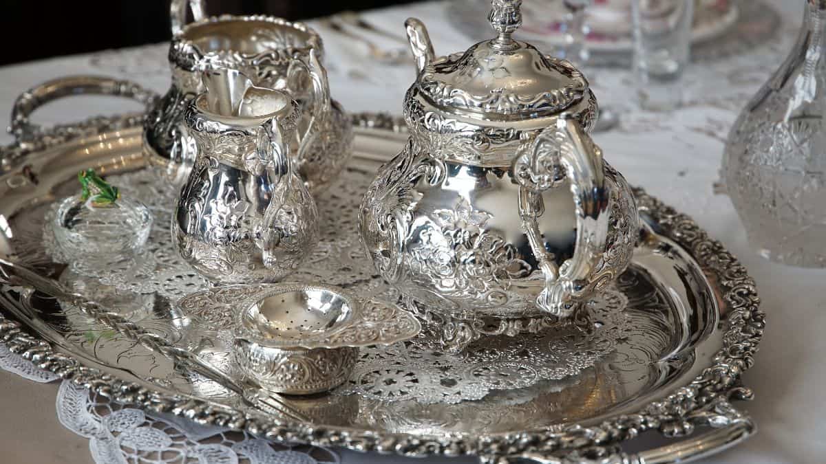 Polished silverware on a table.