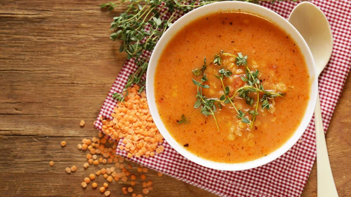 Pumpkin soup topped with thyme.