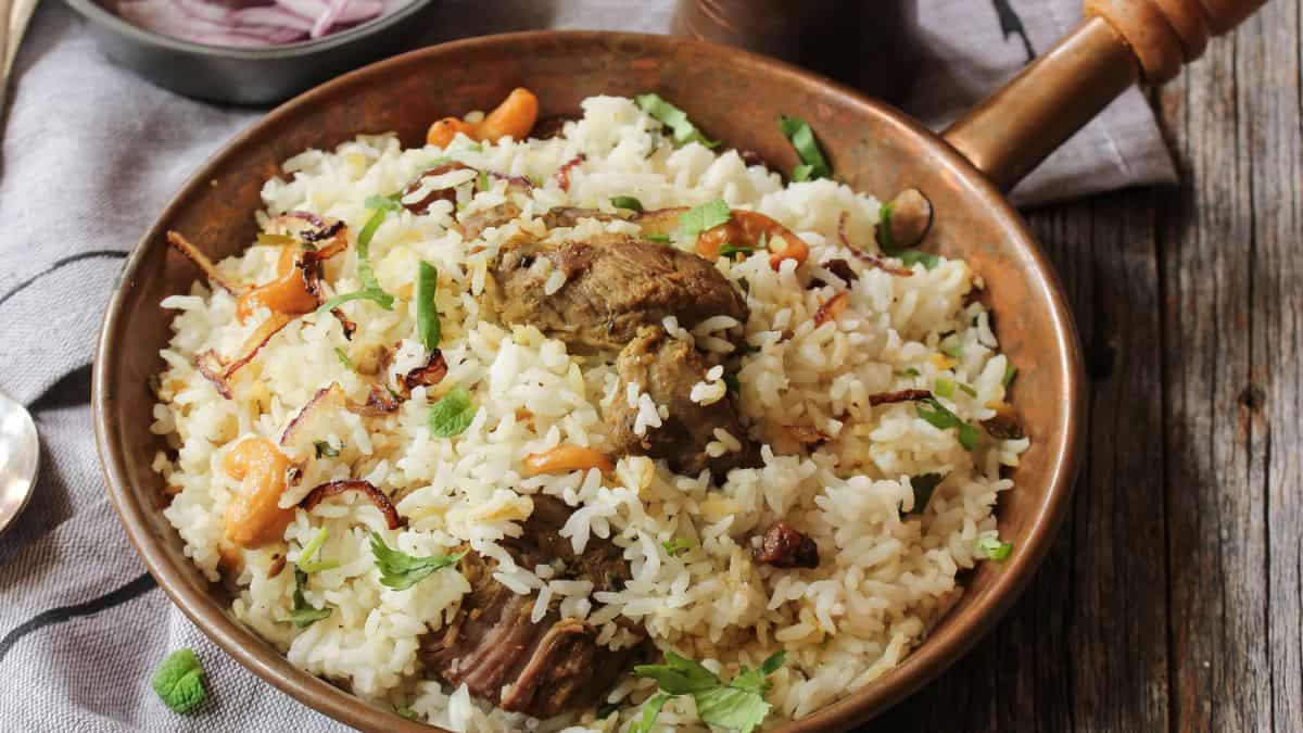 Malabar mutton biryani in a skillet.