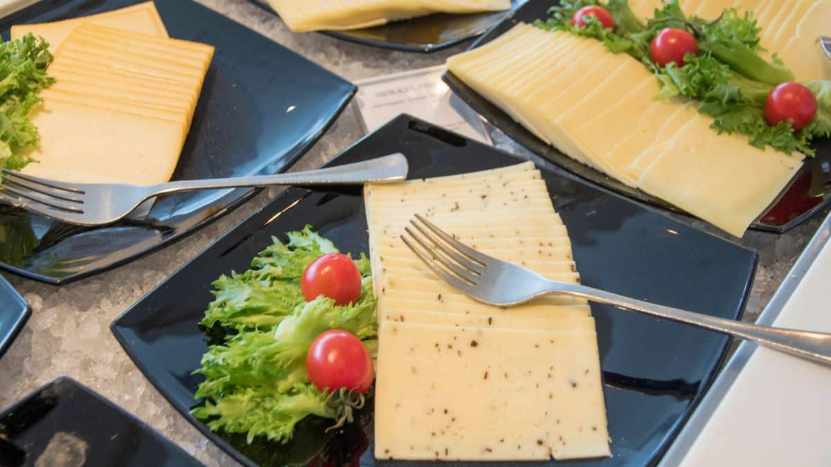 Havarti cheese slices served with salad.