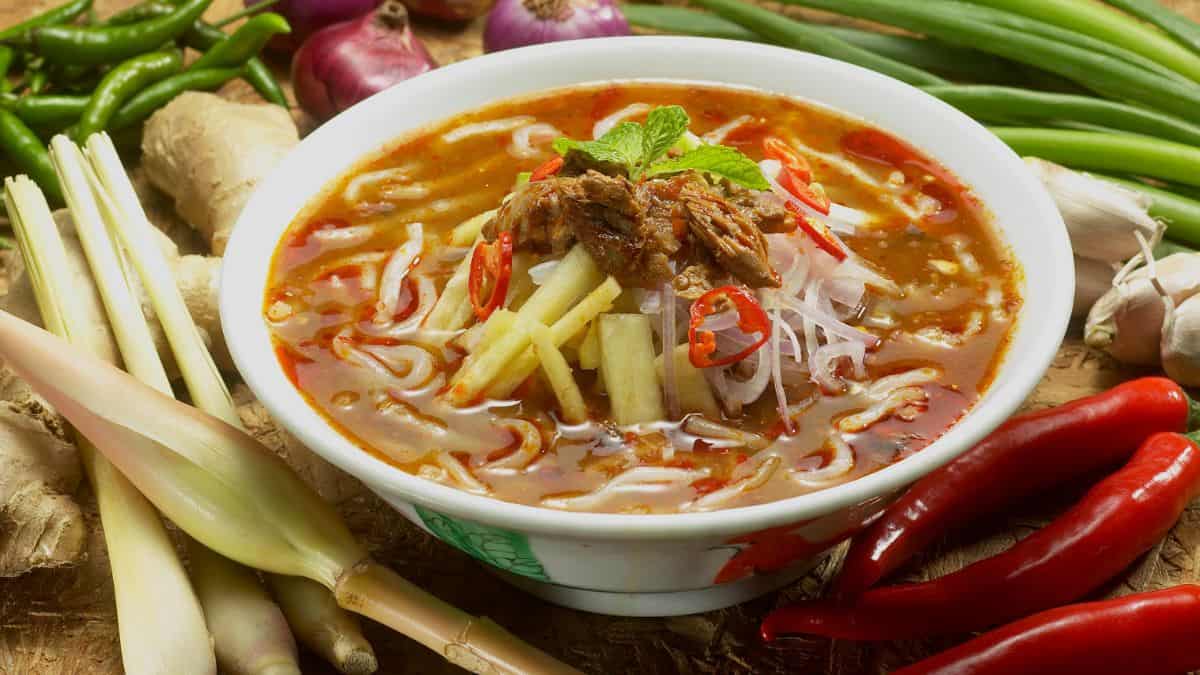 Laksa in a white bowl.