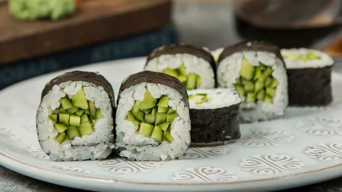 Kappamaki or cucumber sushi on a white plate.