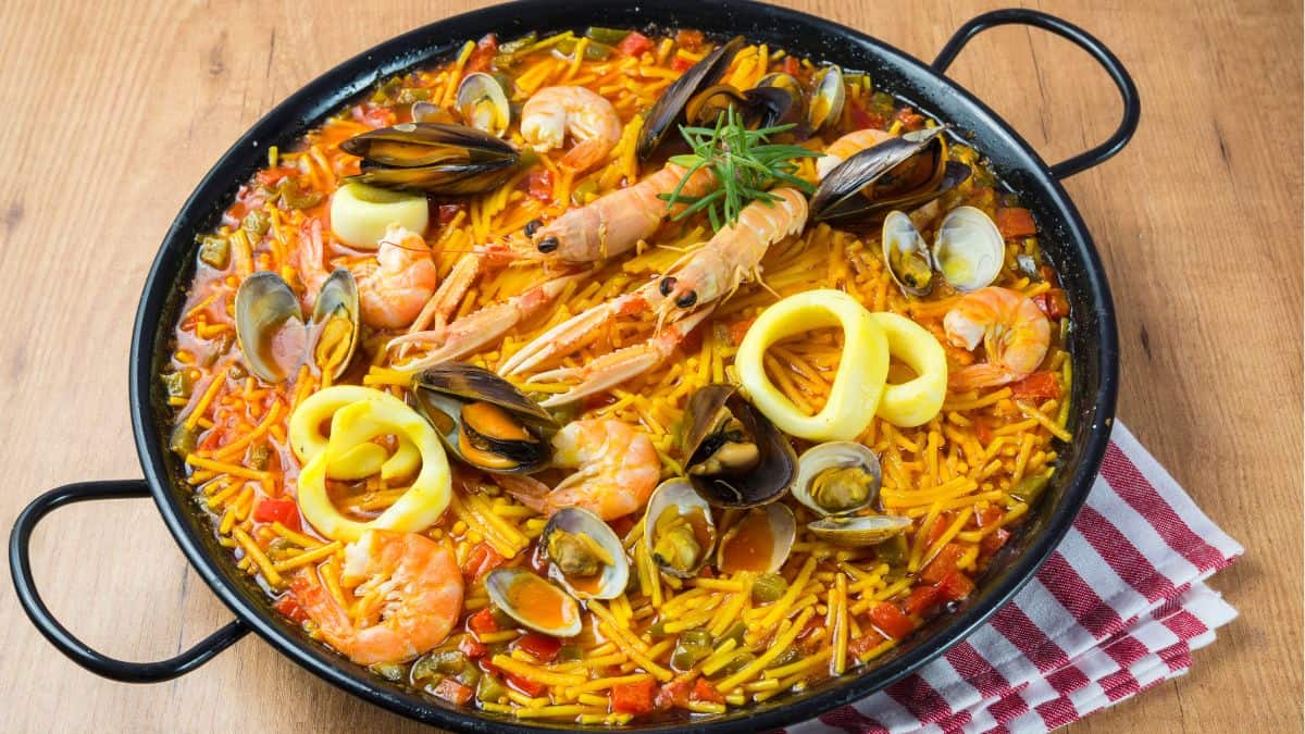 Spanish Fideua in a skillet.