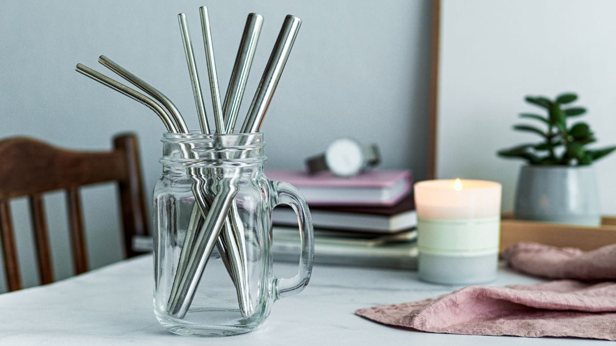 Metal straws kept on a table.