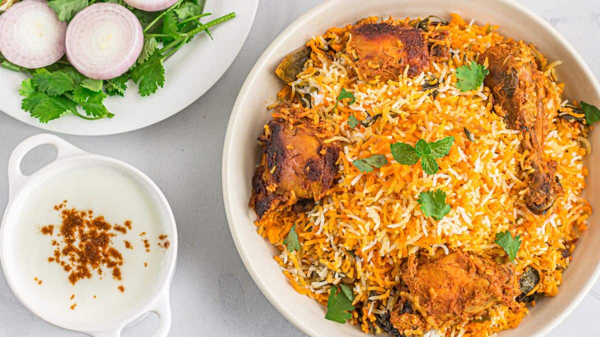 Biryani on a white plate.