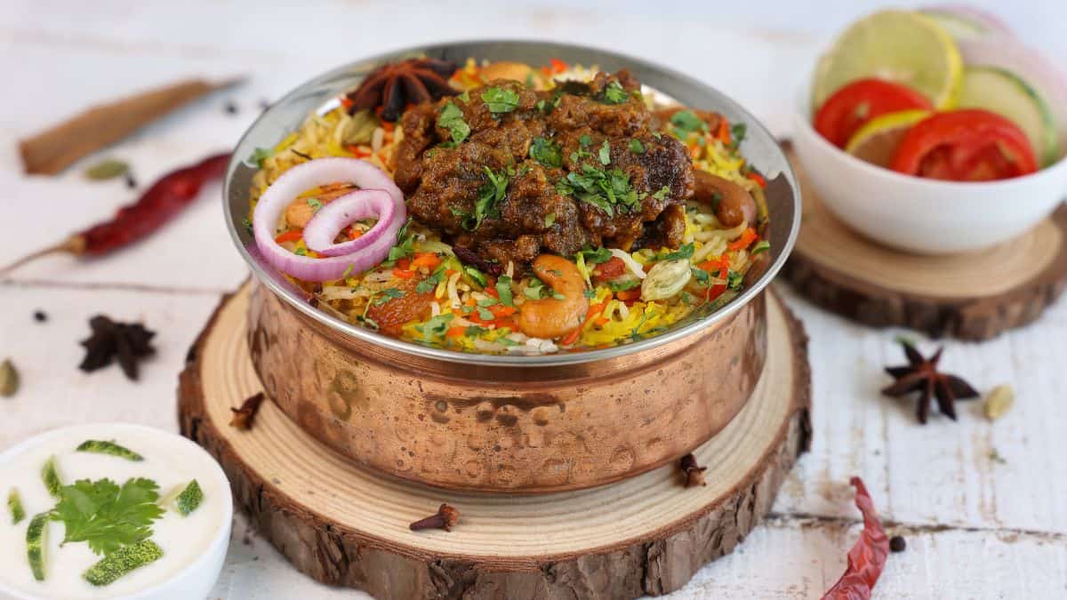 Sri Lankan biryani in a copper bowl.