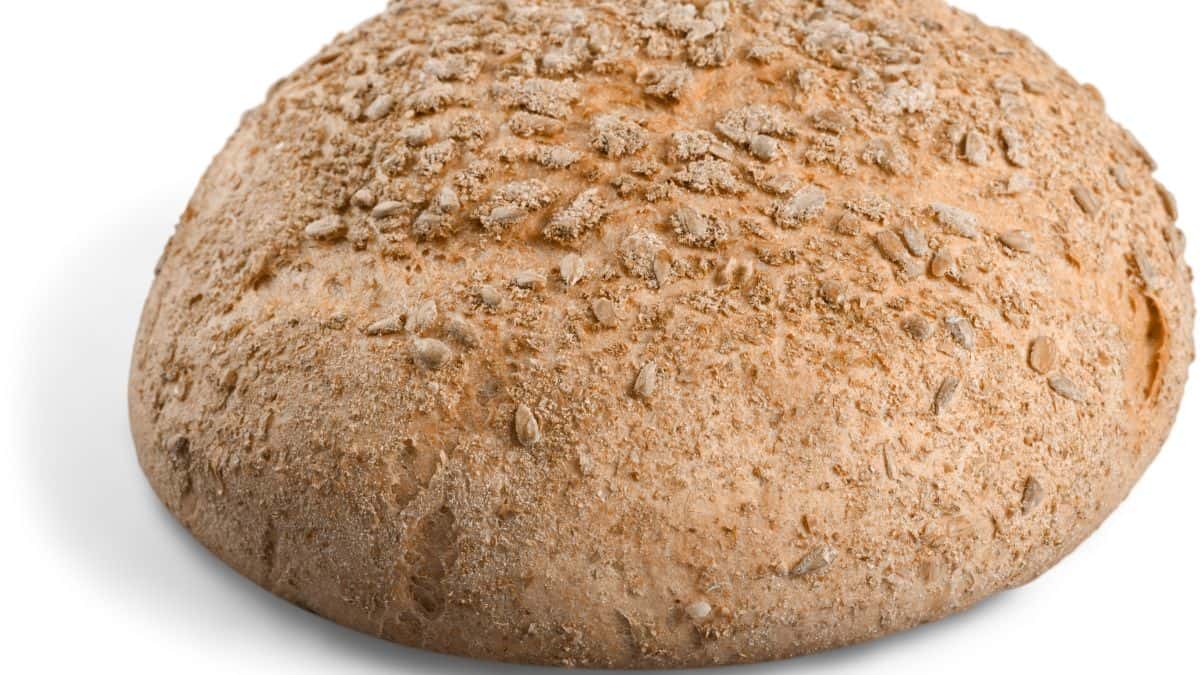 A round loaf of seeded bread.