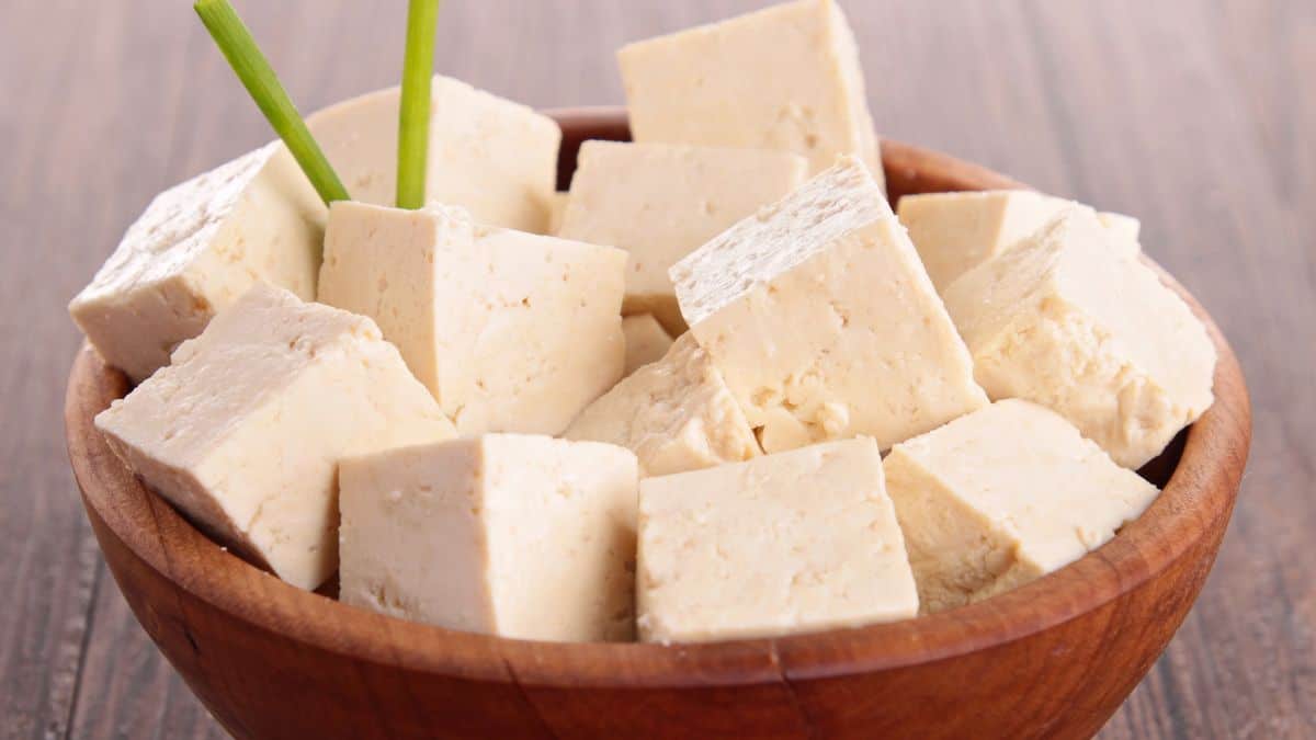 Tofu in a brown bowl.