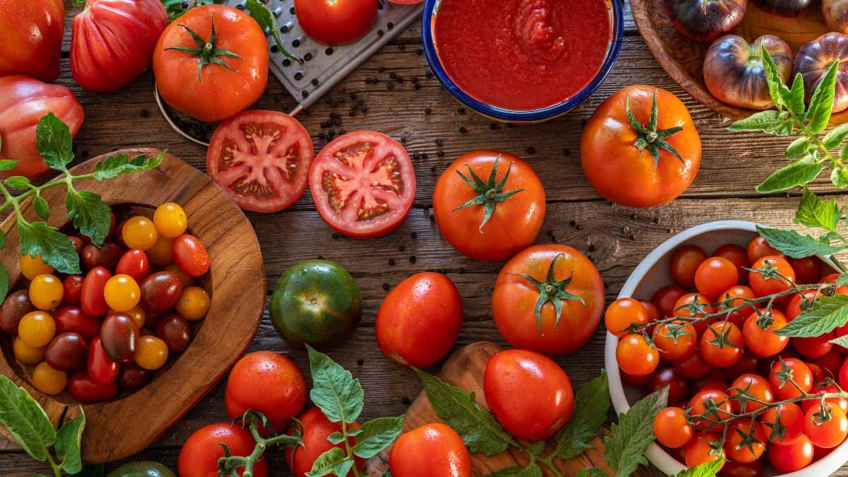 Tomatoes on a wooden board.