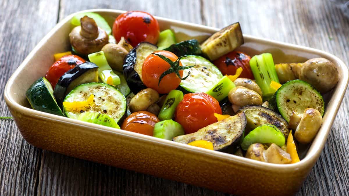 Roasted vegetables in a baking dish.