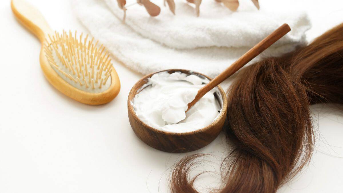 Coconut oil to control frizzy hair.