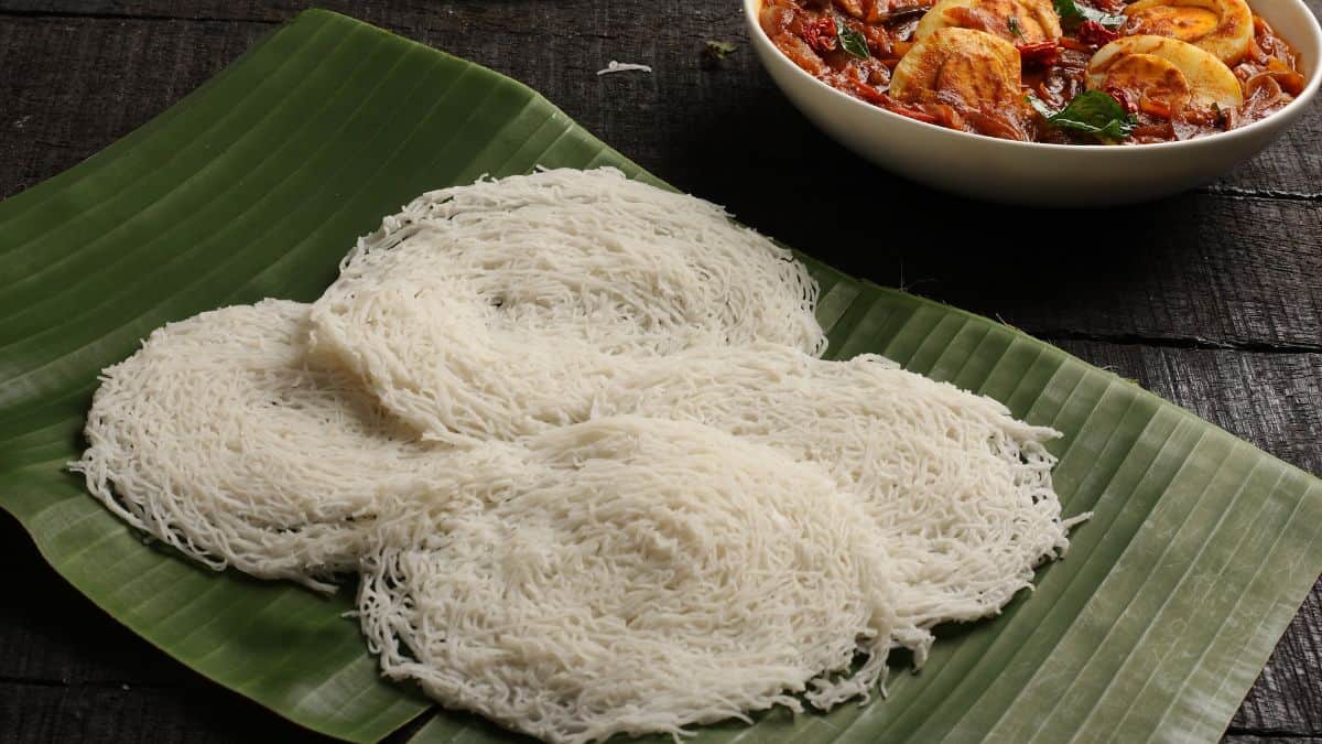 Idiyappam on a banana leaf.