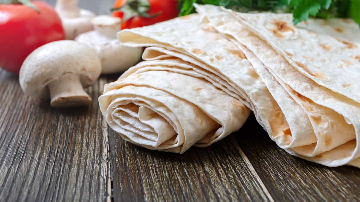 Lavash bread on a wooden board.