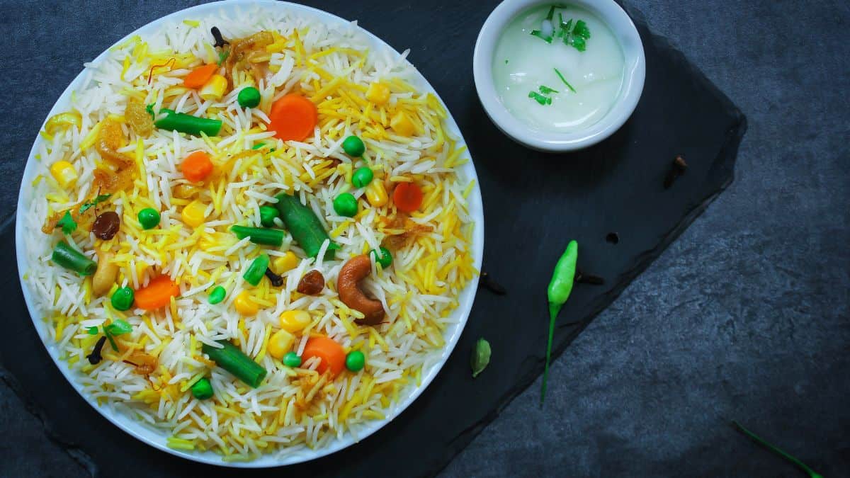 Light sofiyani biryani on a white plate.