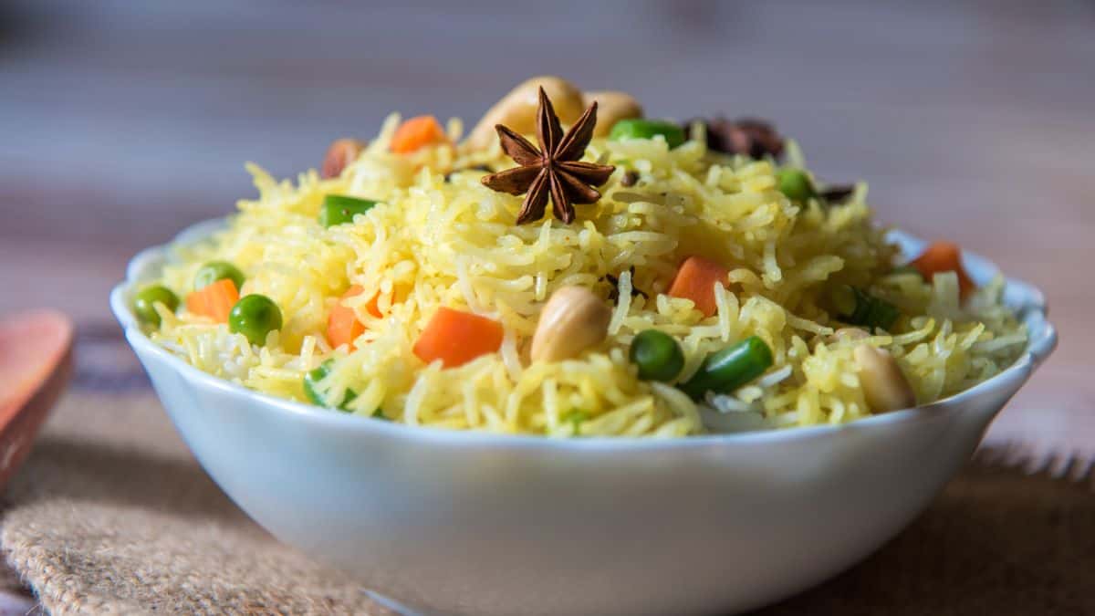 Jodhpuri vegetarian biryani in a white bowl.