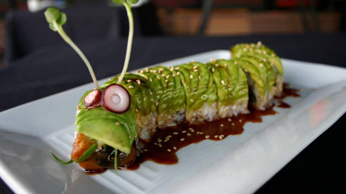 Caterpillar roll on a white plate.