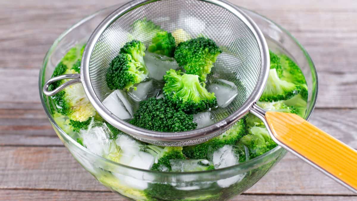 Broccoli blanched in an ice bath.