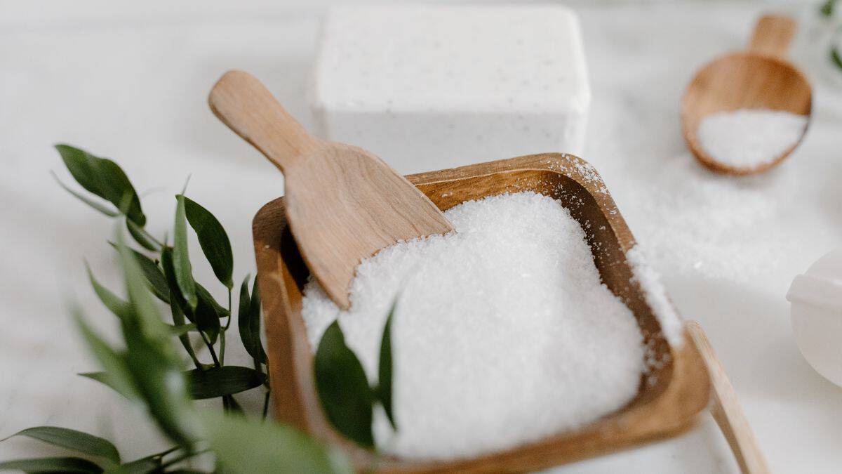 Smoked salt in a wooden bowl.