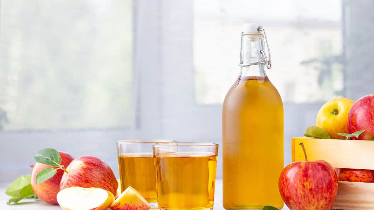 Two glasses of detox drink on a kitchen counter.