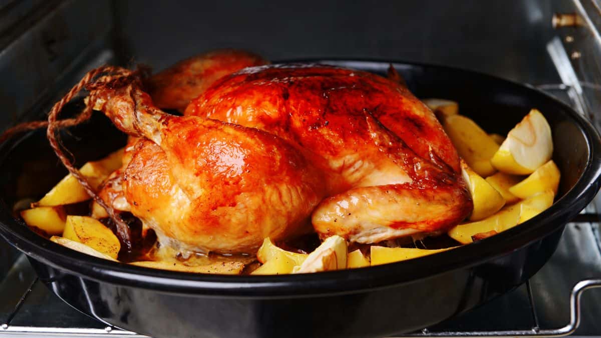 Roast chicken in oven.