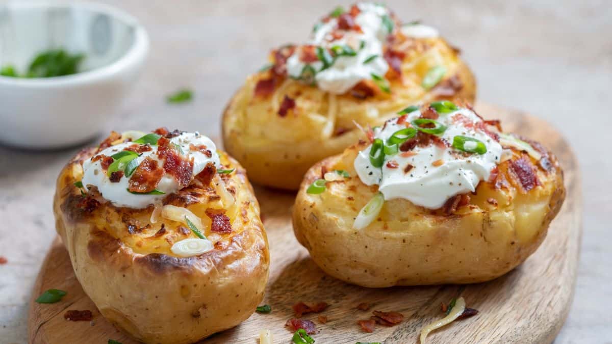 Baked potatoes topped with yogurt.