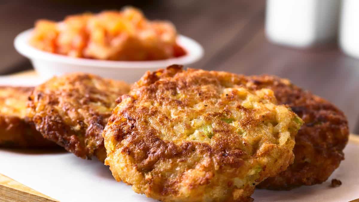 Rice fritters on a wooden board.